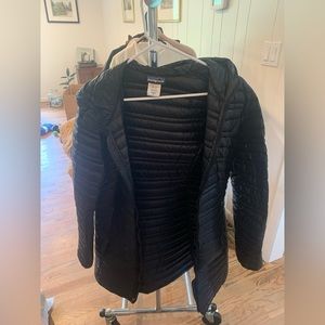 Women’s medium down Patagonia jacket color black. Never wore it. Like new